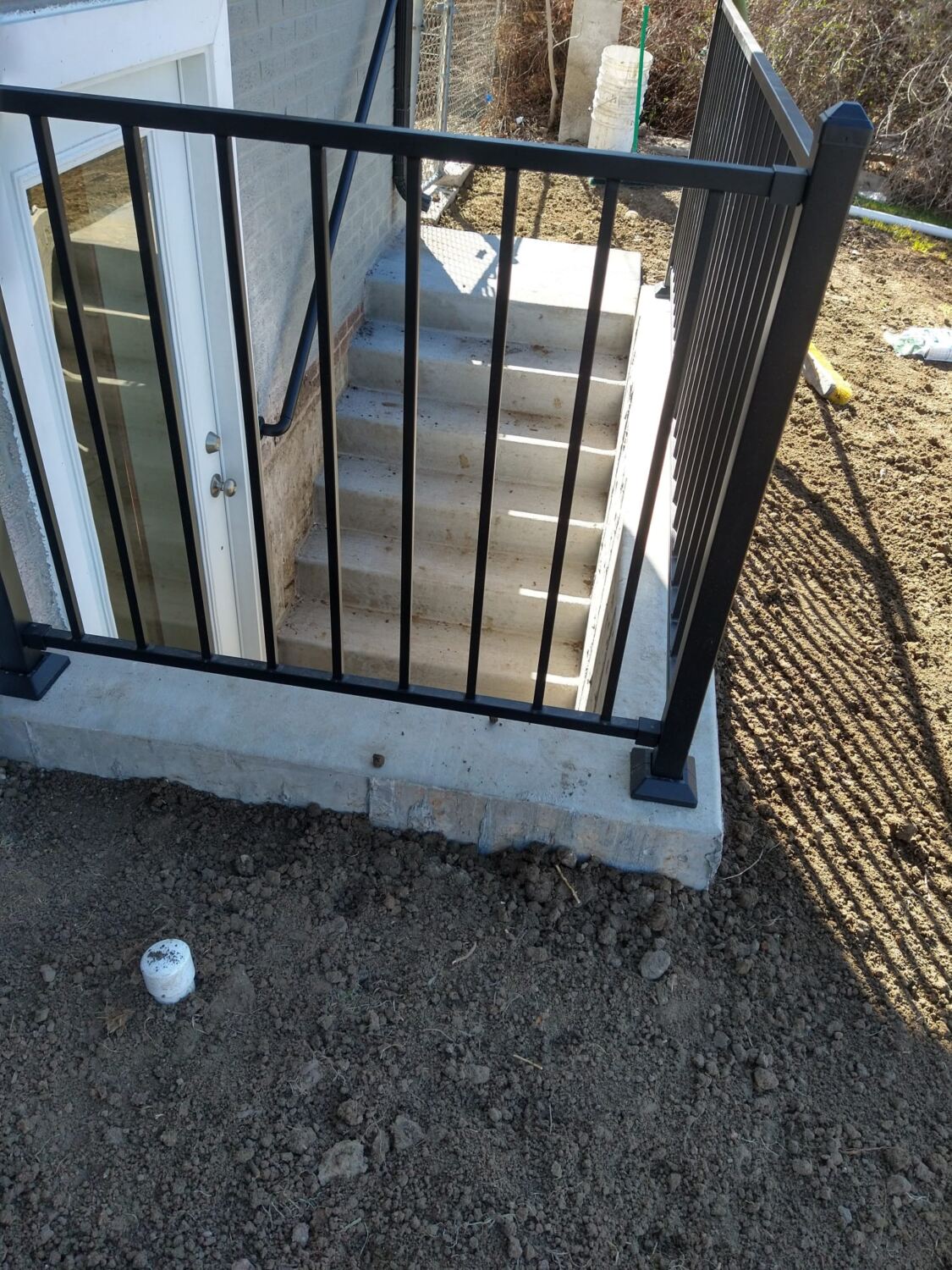 Walk Out Railing Basements - CMH Concrete